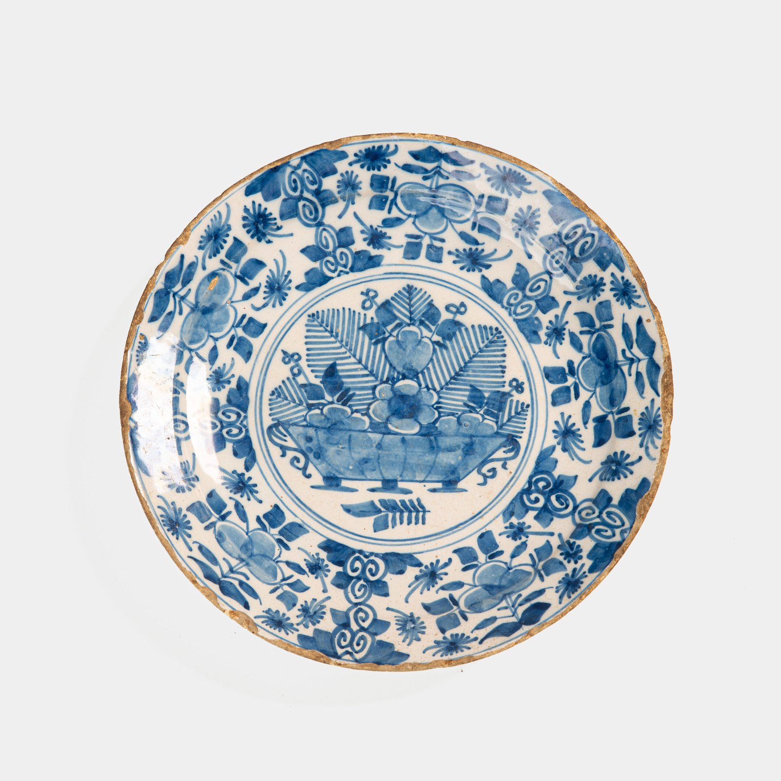 Exceptional 18th century Delft blue and white bowl-shaped plate with floral basket decoration, ca. 1700–1740, Dutch tin-glazed earthenware