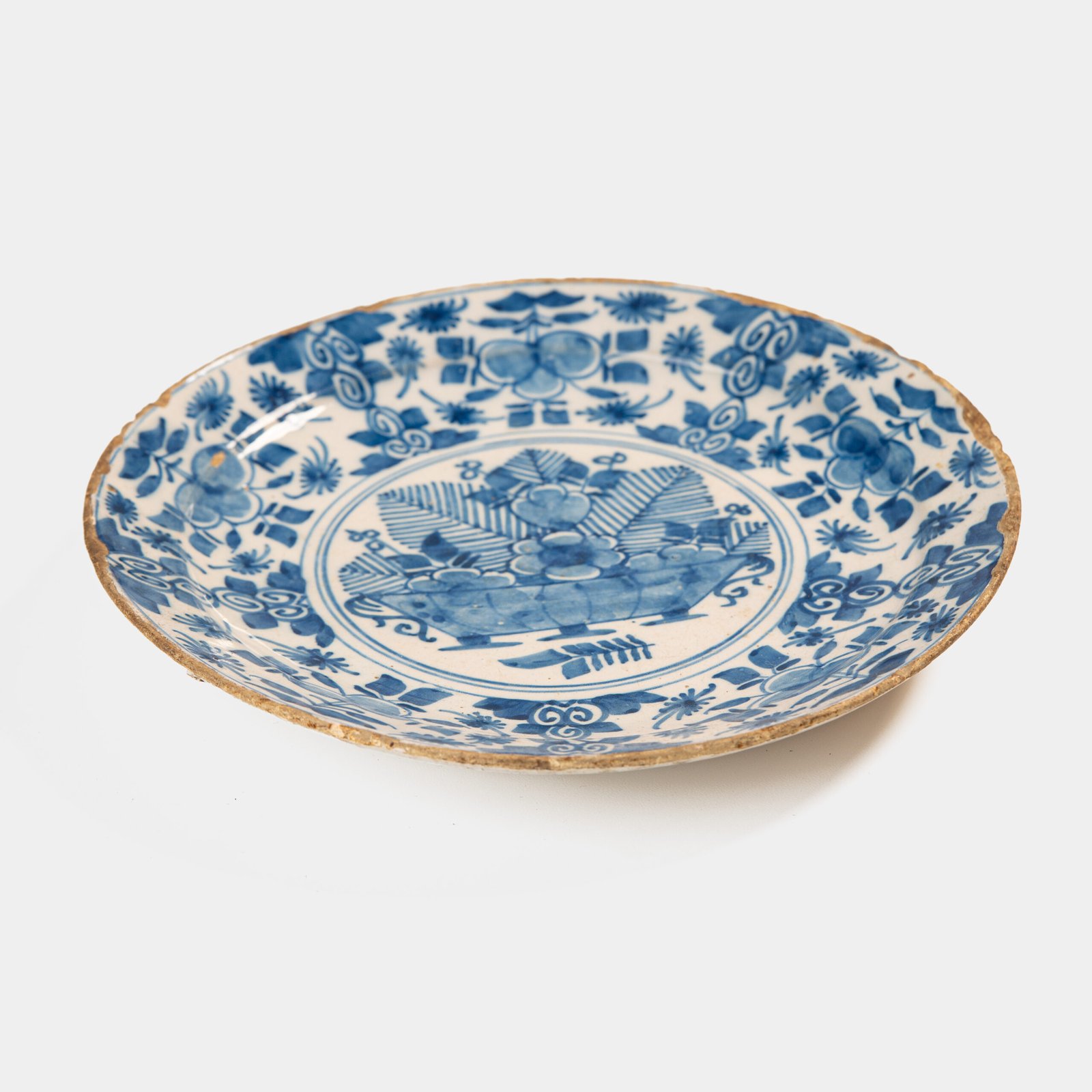 Exceptional 18th century Delft blue and white bowl-shaped plate with floral basket decoration, ca. 1700–1740, Dutch tin-glazed earthenware