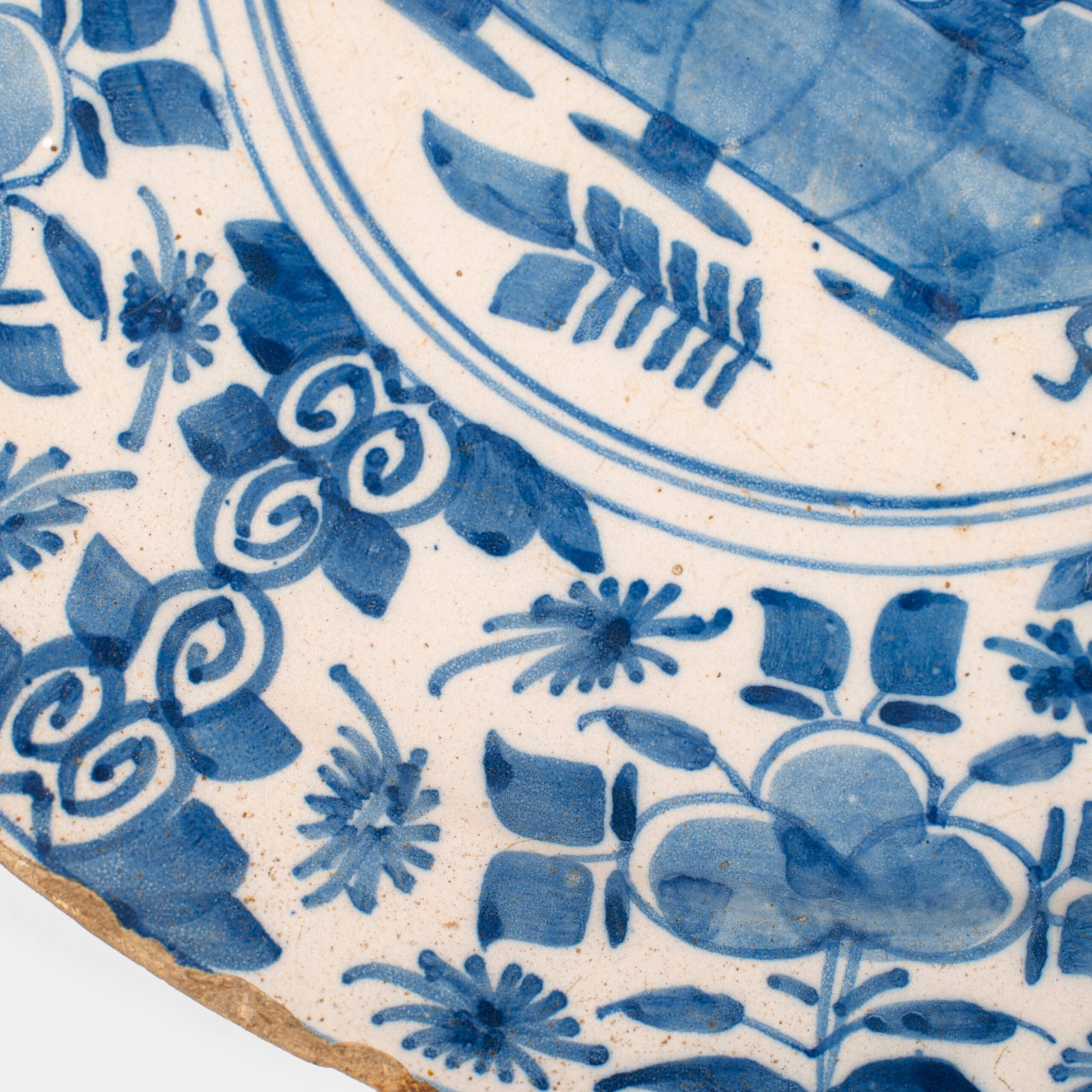 Exceptional 18th century Delft blue and white bowl-shaped plate with floral basket decoration, ca. 1700–1740, Dutch tin-glazed earthenware