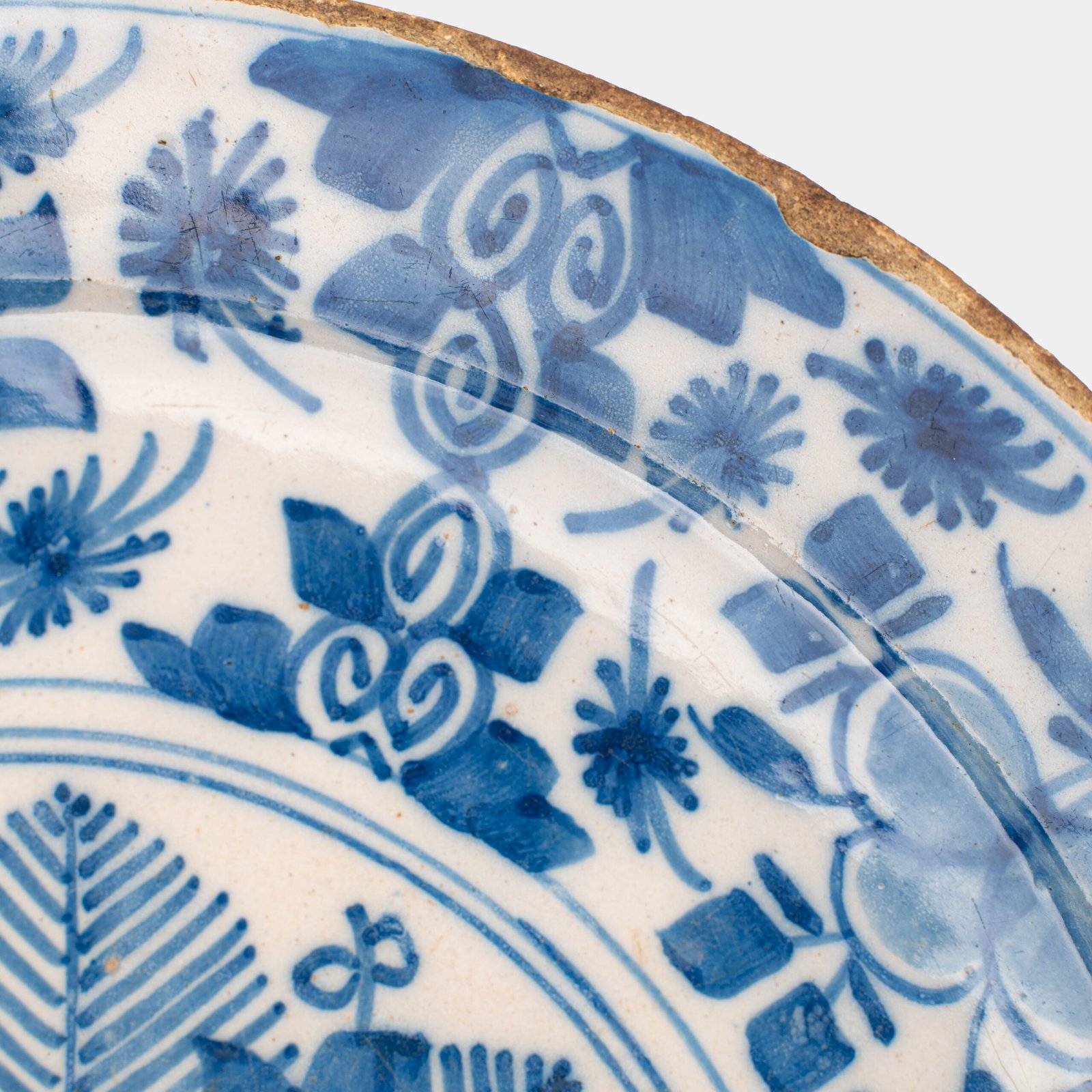 Exceptional 18th century Delft blue and white bowl-shaped plate with floral basket decoration, ca. 1700–1740, Dutch tin-glazed earthenware