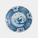 Exceptional Delft plate 18th century by Van den Briel with cobalt-blue rooster and floral decoration, De Grieksche A workshop.