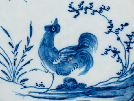 Exceptional Delft plate 18th century by Van den Briel with cobalt-blue rooster and floral decoration, De Grieksche A workshop.