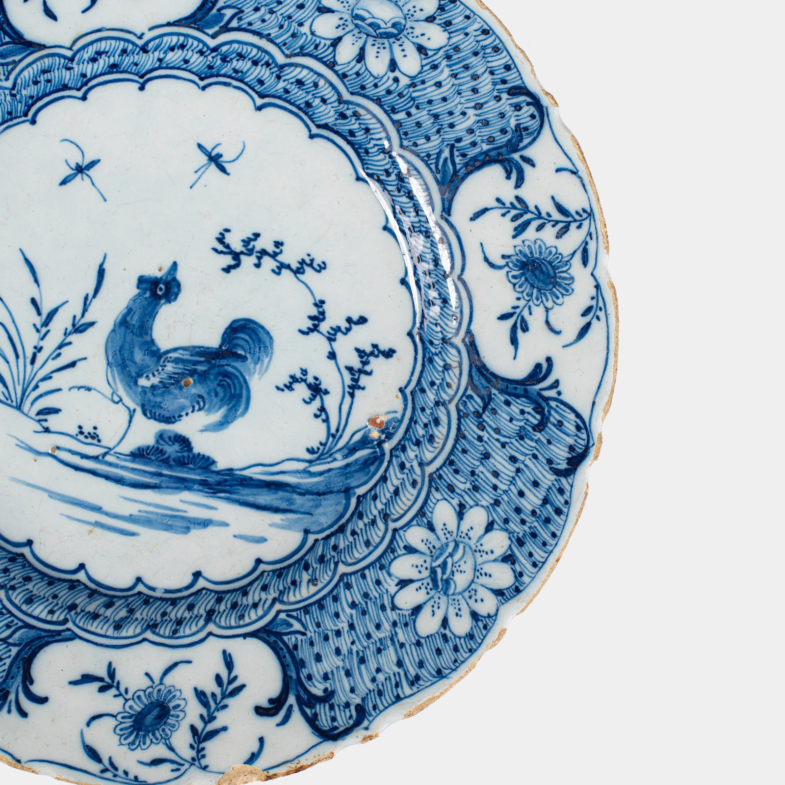 Exceptional Delft plate 18th century by Van den Briel with cobalt-blue rooster and floral decoration, De Grieksche A workshop.