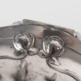 WMF jewelry box in Art Nouveau style by WMF, silver-plated pewter with floral relief decoration and original silk-lined interior, Germany, circa 1900