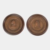 Monumental pair of 19th century French copper plaques, 24.4 inch diameter, depicting King Henry IV of France and Queen Marie de’ Medici, repoussé copper wall plaques in original wooden frames
