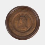 Monumental pair of 19th century French copper plaques, 24.4 inch diameter, depicting King Henry IV of France and Queen Marie de’ Medici, repoussé copper wall plaques in original wooden frames