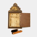 Dutch Mirror Cabinet in embossed brass with windmill motif, beveled mirror door and interior brushes, circa 1890–1920.