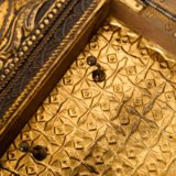 Dutch Mirror Cabinet in embossed brass with windmill motif, beveled mirror door and interior brushes, circa 1890–1920.