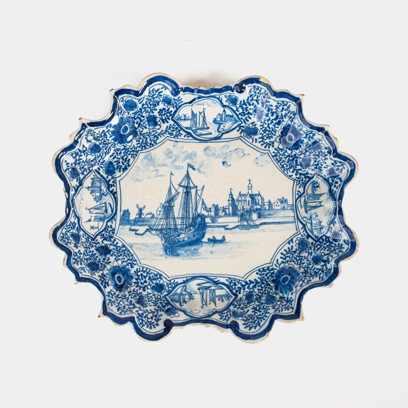 Early Delft lobed dish with harbour scene, hand-painted in cobalt blue, Netherlands c. 1695–1720