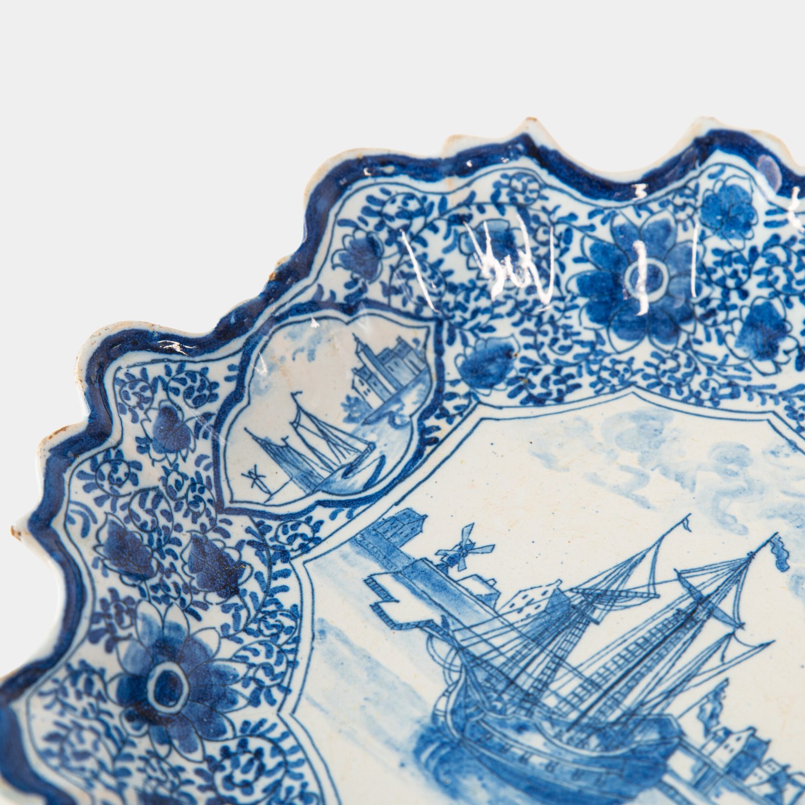 Early Delft lobed dish with harbour scene, hand-painted in cobalt blue, Netherlands c. 1695–1720