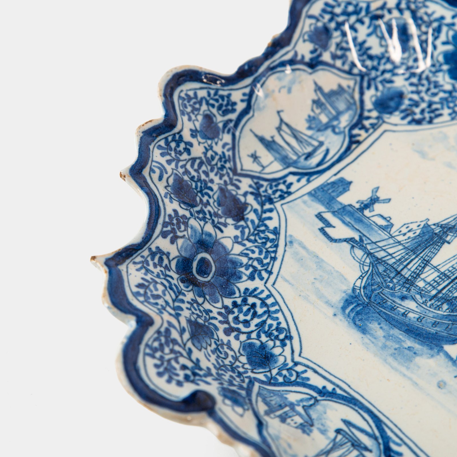 Early Delft lobed dish with harbour scene, hand-painted in cobalt blue, Netherlands c. 1695–1720