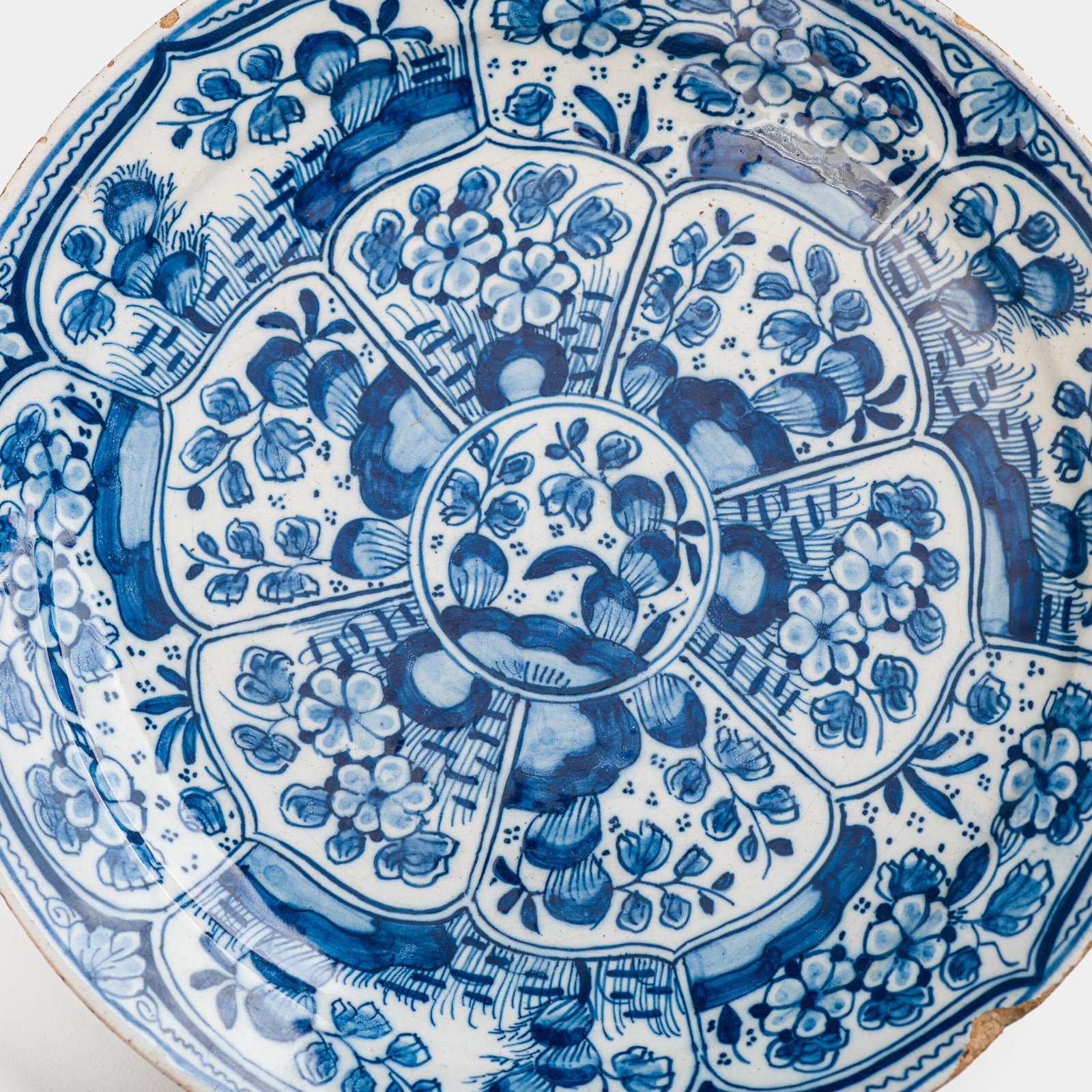 De Witte Ster Delft blue and white plate with six-pointed star and CB underglaze mark, Cornelis Brouwer period, ca. 1724–1738
