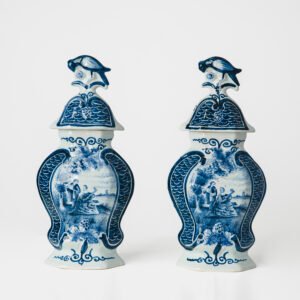 Antique Delft Vases in cobalt blue with lid and bird finial, hand-painted hexagonal bodies with Dutch scenes and blue underglaze mark on the base.
