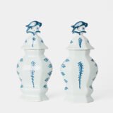 Antique Delft Vases in cobalt blue with lid and bird finial, hand-painted hexagonal bodies with Dutch scenes and blue underglaze mark on the base.