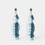 Antique Delft Vases in cobalt blue with lid and bird finial, hand-painted hexagonal bodies with Dutch scenes and blue underglaze mark on the base.