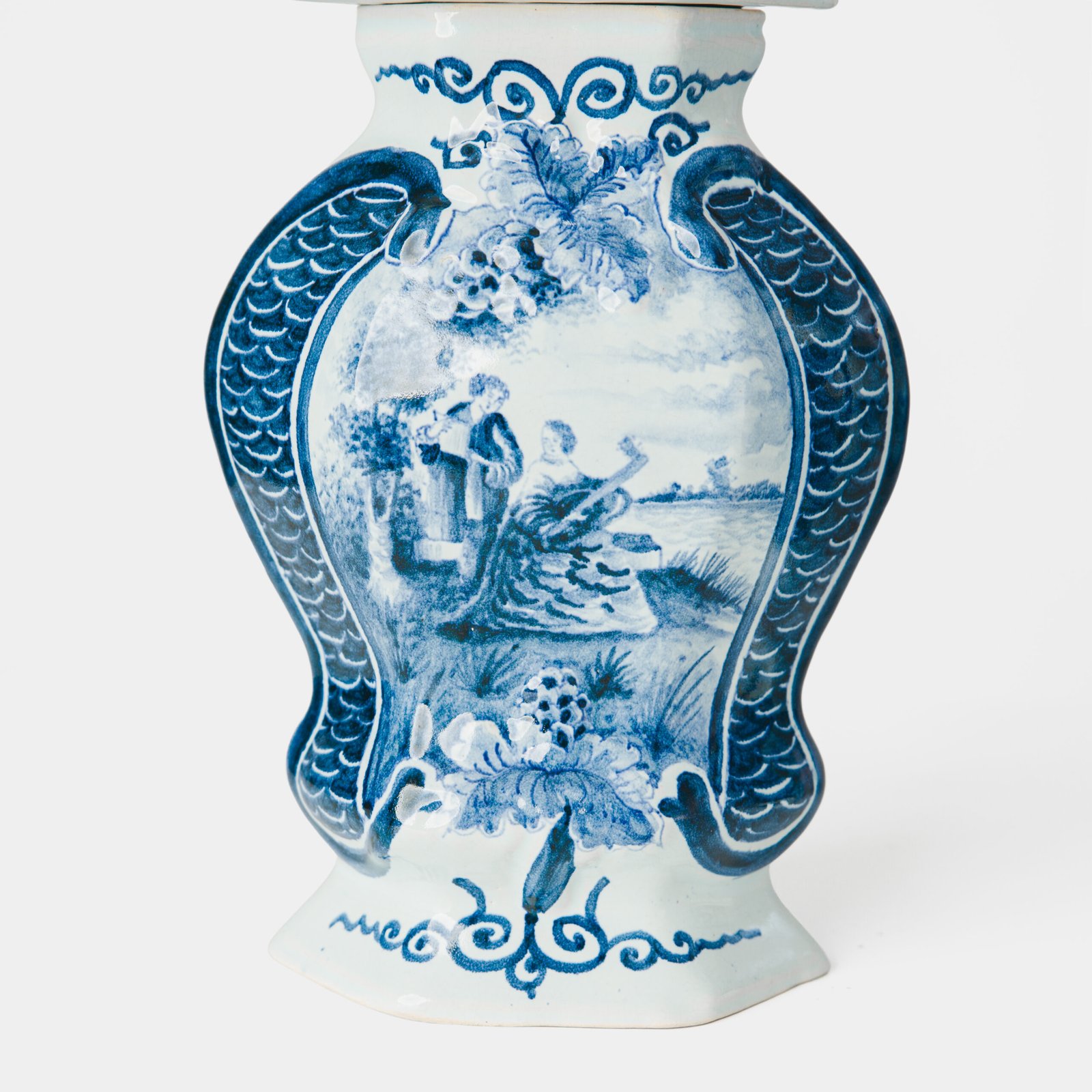 Antique Delft Vases in cobalt blue with lid and bird finial, hand-painted hexagonal bodies with Dutch scenes and blue underglaze mark on the base.