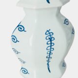 Antique Delft Vases in cobalt blue with lid and bird finial, hand-painted hexagonal bodies with Dutch scenes and blue underglaze mark on the base.