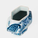 Antique Delft Vases in cobalt blue with lid and bird finial, hand-painted hexagonal bodies with Dutch scenes and blue underglaze mark on the base.