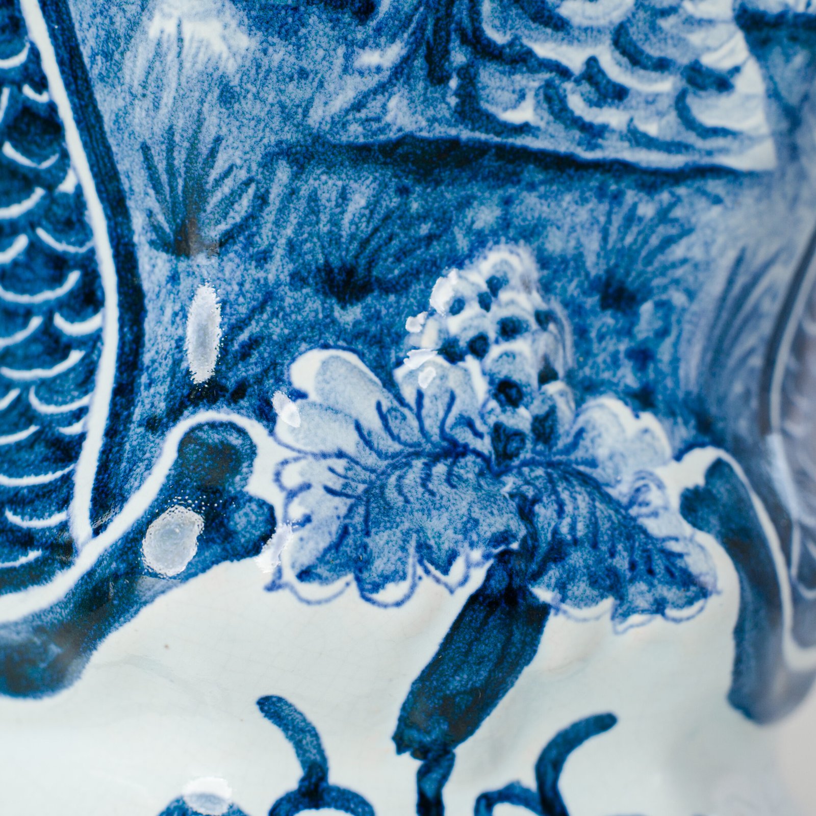Antique Delft Vases in cobalt blue with lid and bird finial, hand-painted hexagonal bodies with Dutch scenes and blue underglaze mark on the base.