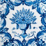 Antique Delft Plate from the early 18th century, crafted at the De Drie Porceleyne Flessies workshop, featuring the WK mark of Willem van der Kool and his widow Cornelia van Schoonhoven.