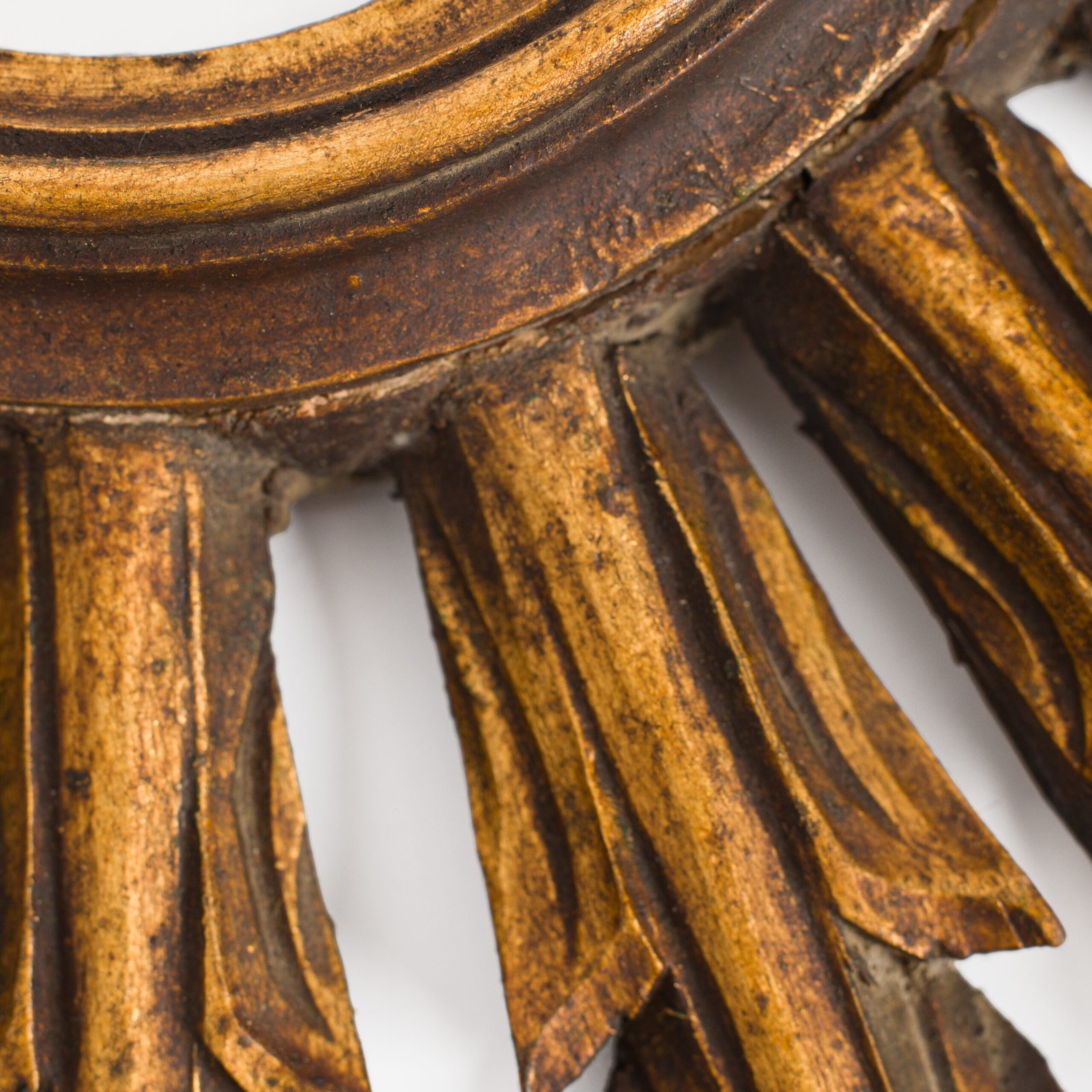 Portuguese Gilt Sunburst Mirror, ca. 1930 – hand-carved wood with water gilding in gold leaf, authentic patina and Portuguese Art Deco craftsmanship, piece available at Strana & Antic.