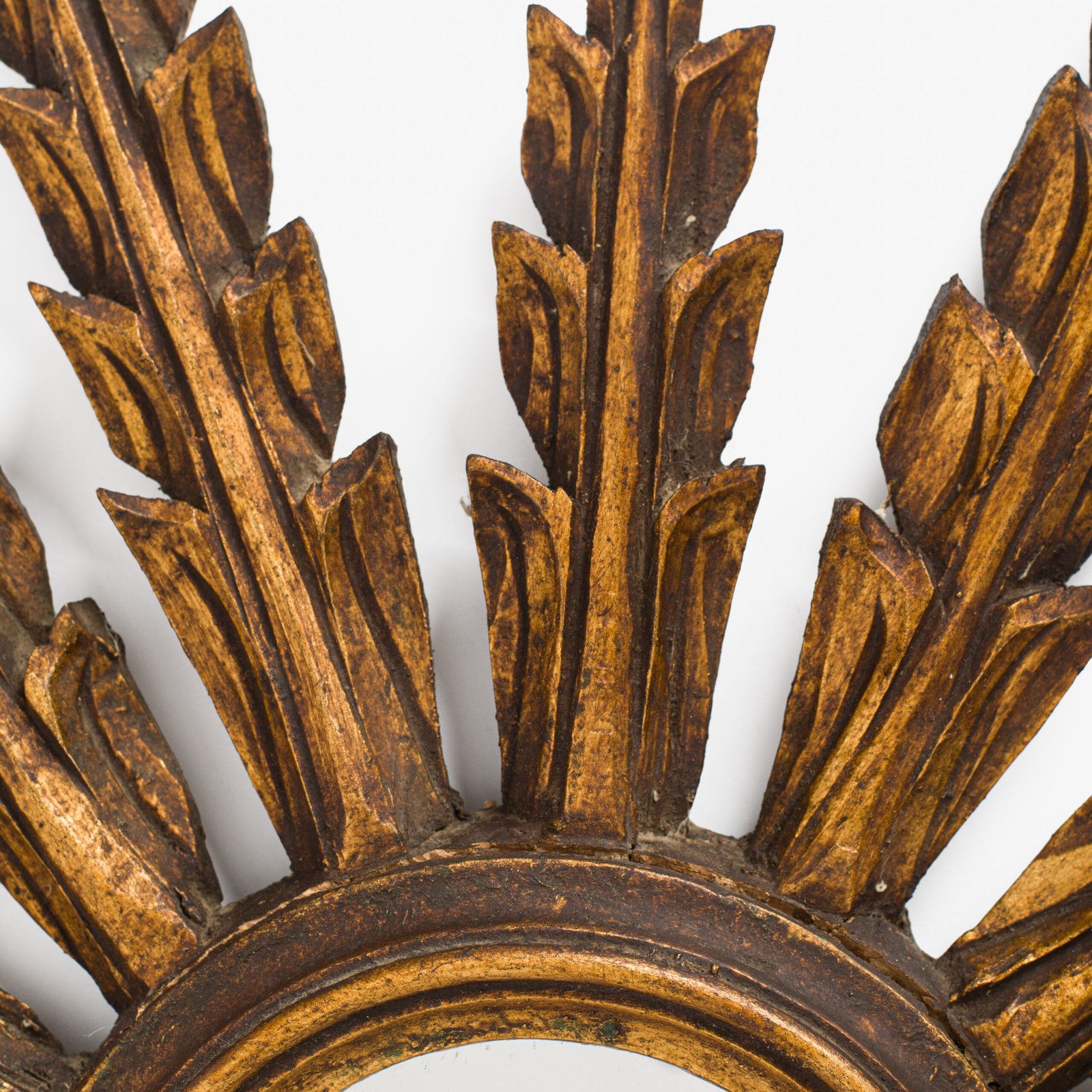 Portuguese Gilt Sunburst Mirror, ca. 1930 – hand-carved wood with water gilding in gold leaf, authentic patina and Portuguese Art Deco craftsmanship, piece available at Strana & Antic.