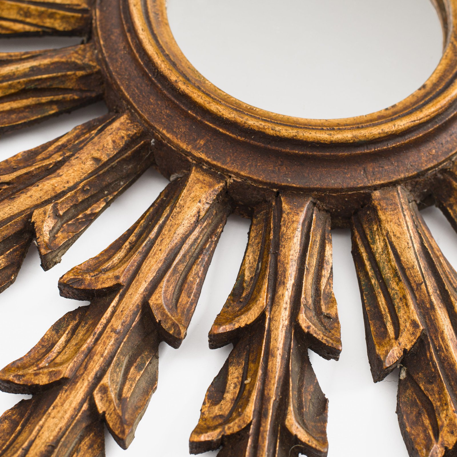 Portuguese Gilt Sunburst Mirror, ca. 1930 – hand-carved wood with water gilding in gold leaf, authentic patina and Portuguese Art Deco craftsmanship, piece available at Strana & Antic.