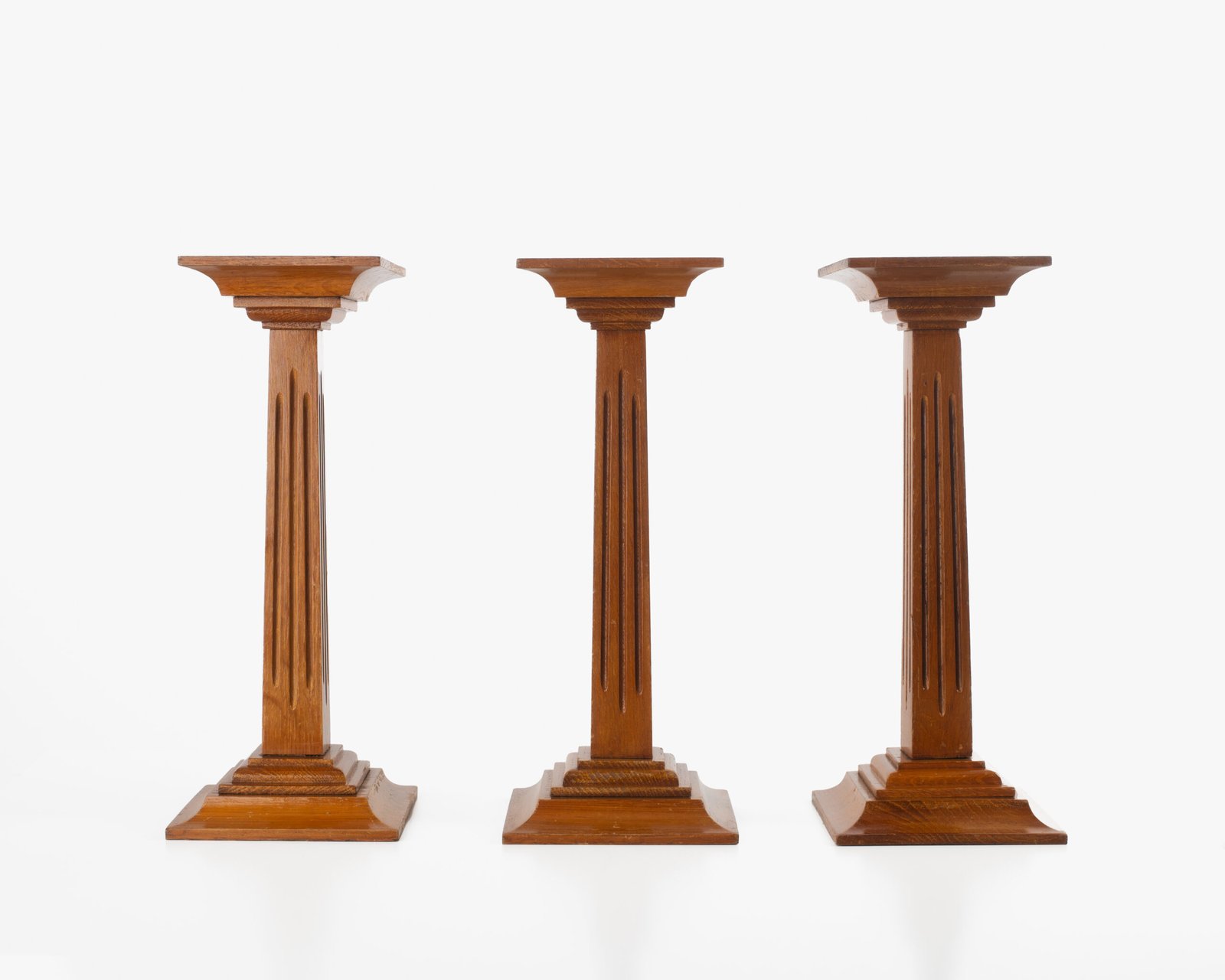 Art Deco Pedestals by Siegel Paris, Set of Three French Display Columns in Solid Wood, Original Luxury Store Fixtures, France, Circa 1925–1935.