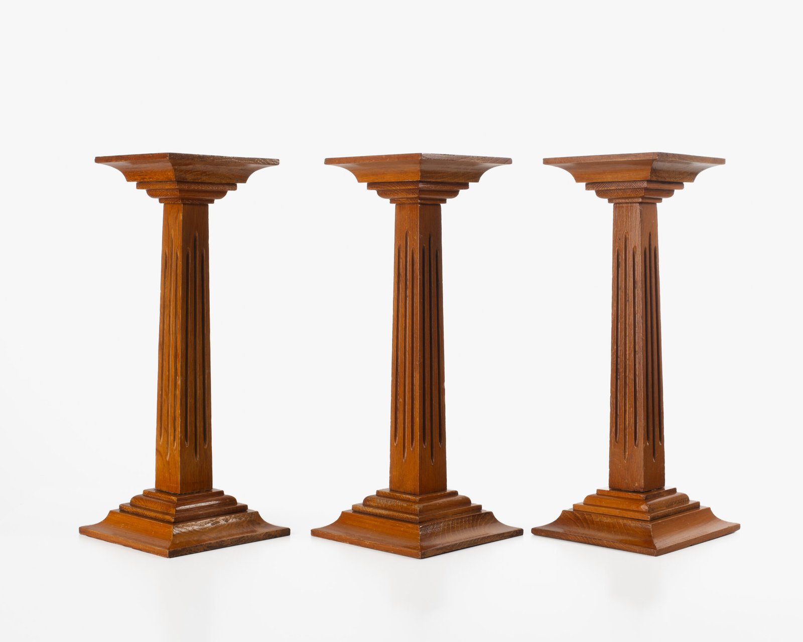 Art Deco Pedestals by Siegel Paris, Set of Three French Display Columns in Solid Wood, Original Luxury Store Fixtures, France, Circa 1925–1935.