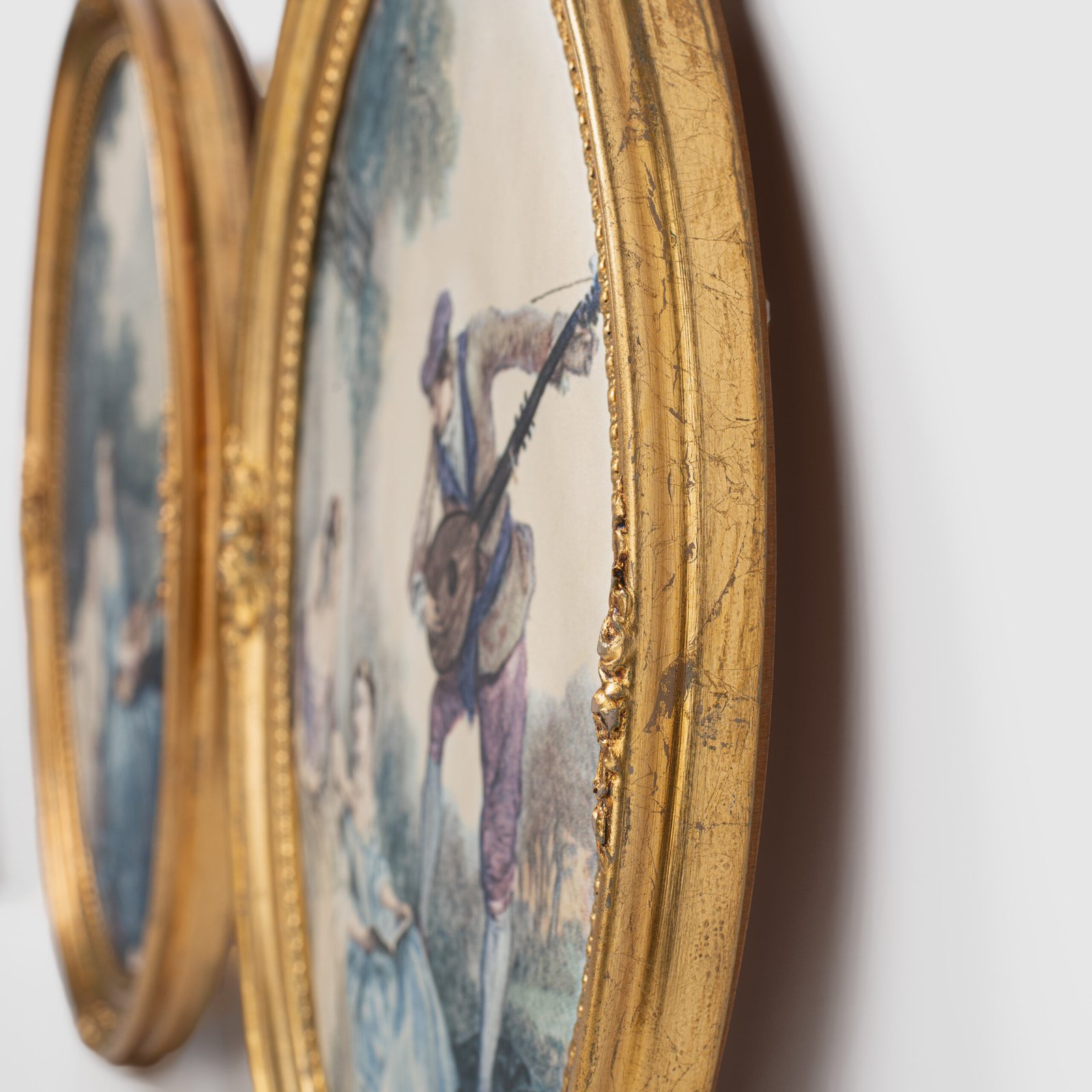French silk prints in gilt oval wooden frames, French Rococo style, Music Class scene, circa 1930s, vintage decorative wall art pair