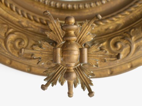 Antique Swedish Brass Mirror with repoussé Neoclassical frame and original beveled glass, 1890–1910.