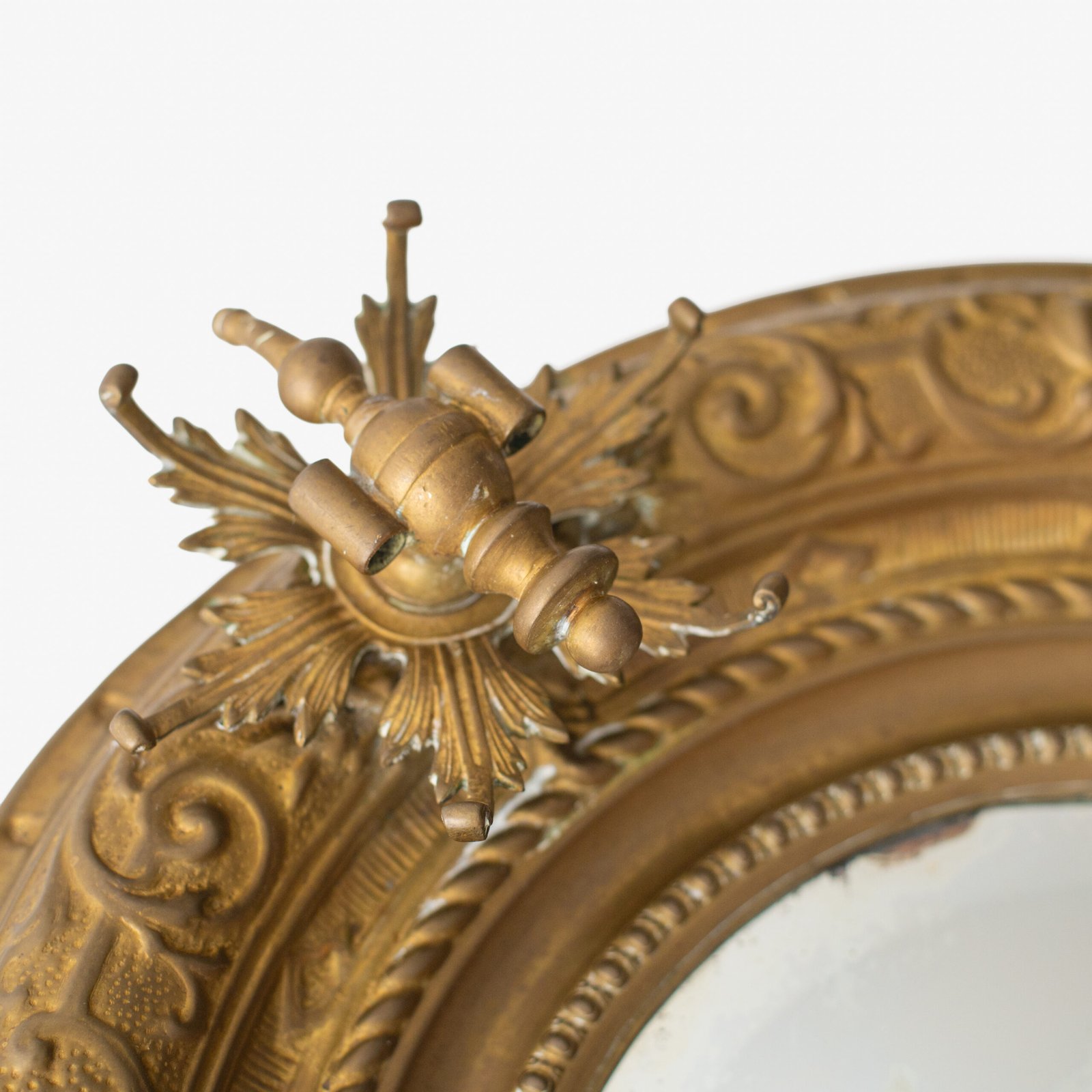 Antique Swedish Brass Mirror with repoussé Neoclassical frame and original beveled glass, 1890–1910.