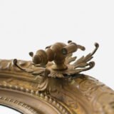 Antique Swedish Brass Mirror with repoussé Neoclassical frame and original beveled glass, 1890–1910.