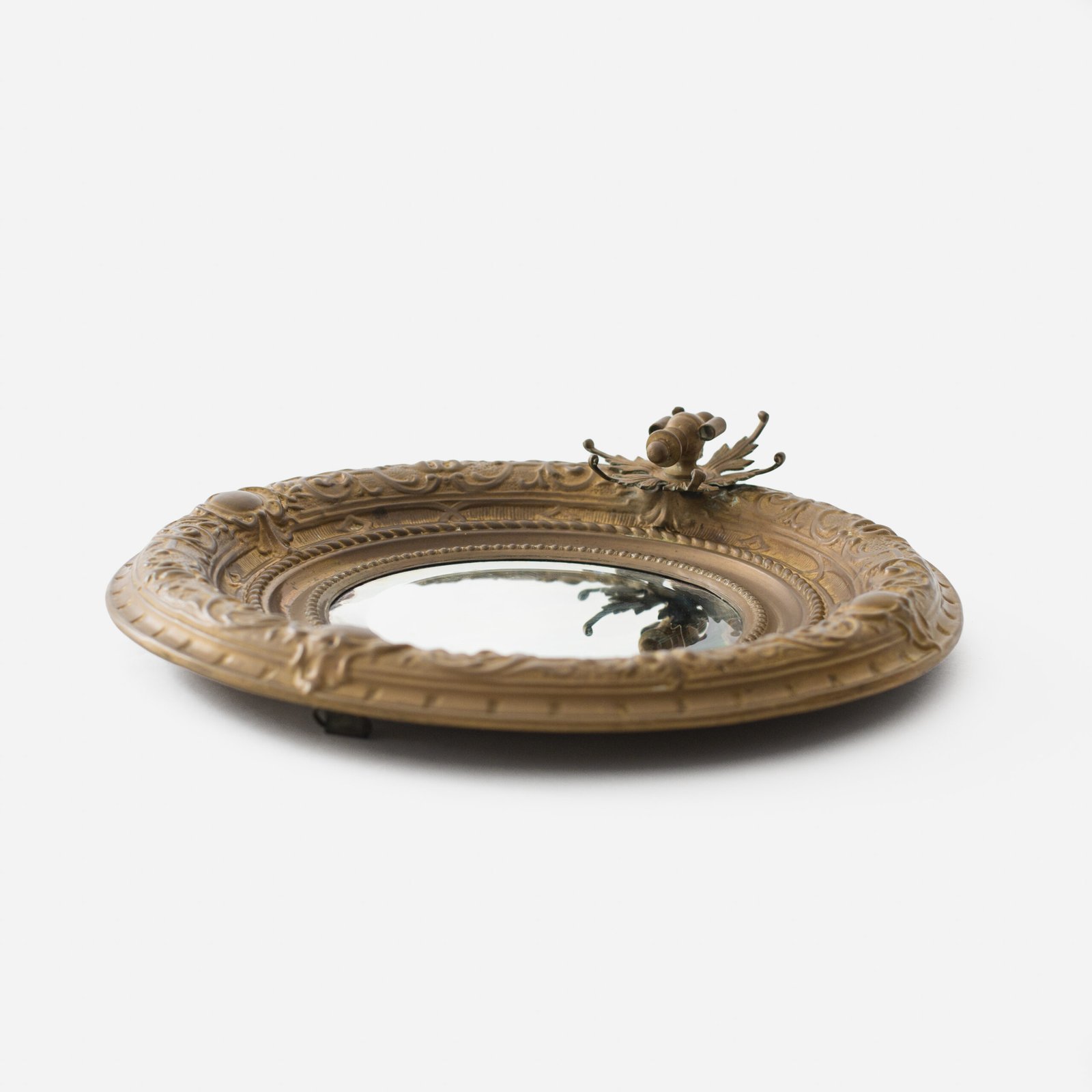 Antique Swedish Brass Mirror with repoussé Neoclassical frame and original beveled glass, 1890–1910.