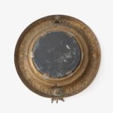 Antique Swedish Brass Mirror with repoussé Neoclassical frame and original beveled glass, 1890–1910.