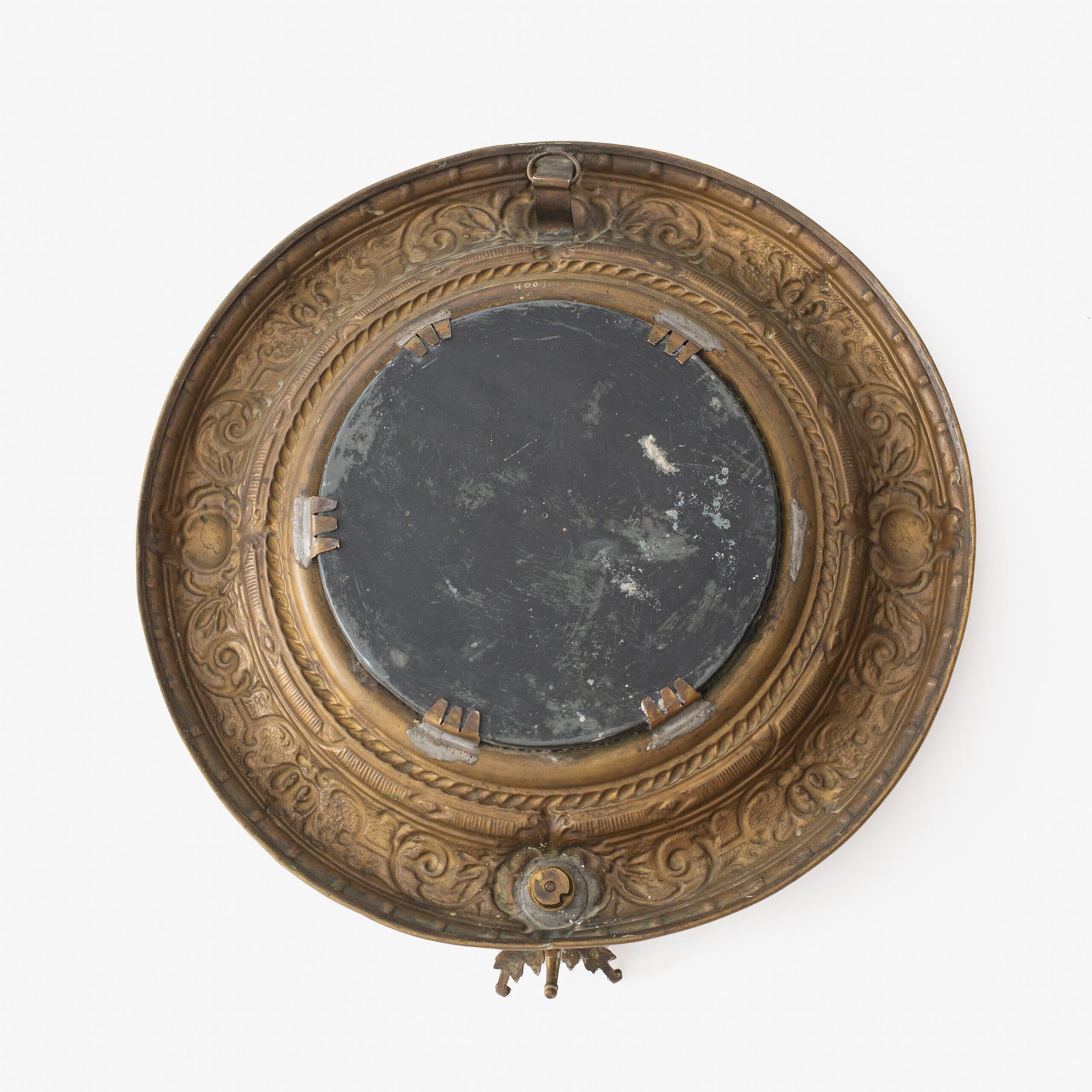 Antique Swedish Brass Mirror with repoussé Neoclassical frame and original beveled glass, 1890–1910.