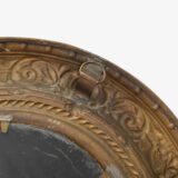 Antique Swedish Brass Mirror with repoussé Neoclassical frame and original beveled glass, 1890–1910.