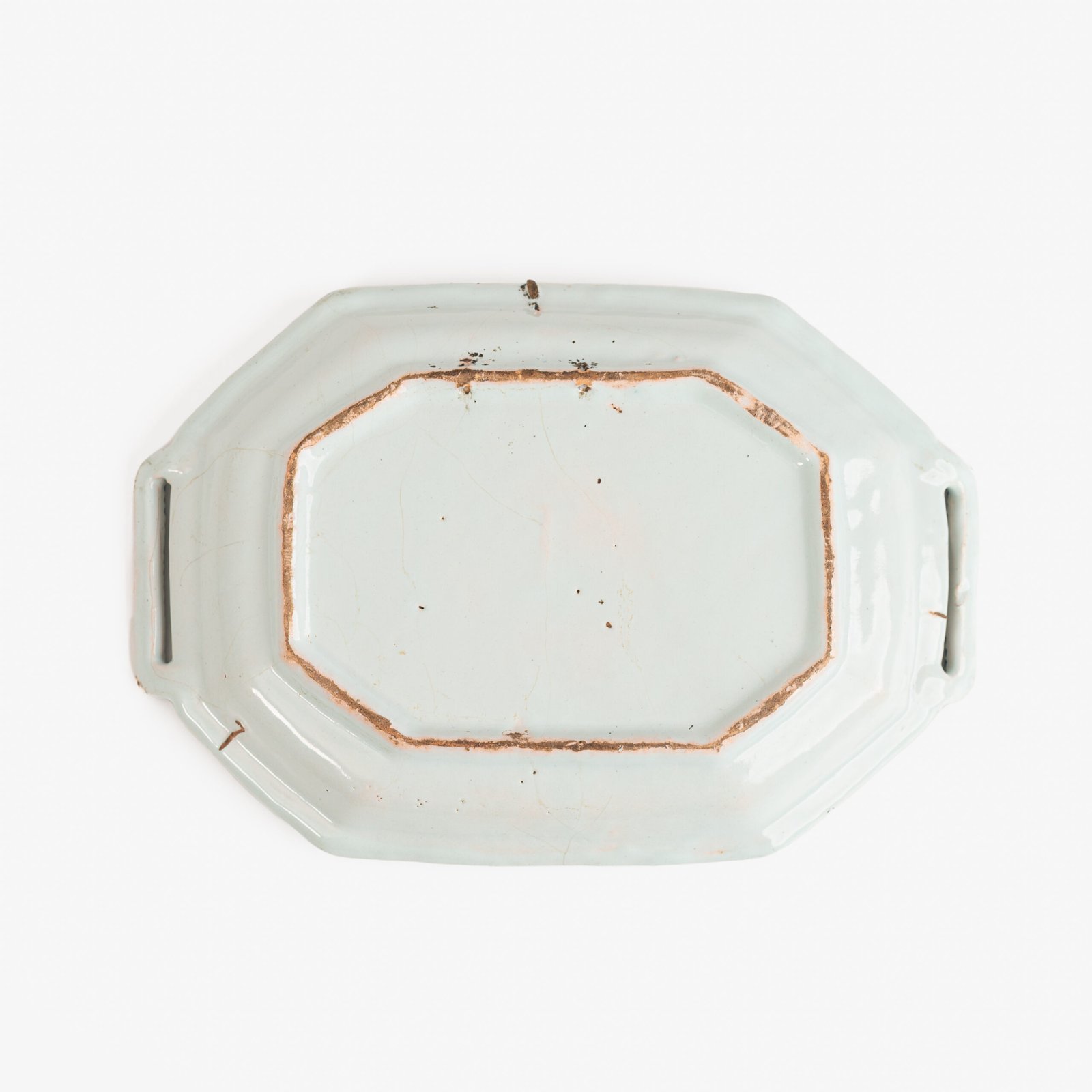 Rouen Faience Tray, an octagonal French banette from c. 1730 with two handles, a painted flower basket, and a red and blue galon rouennais border.