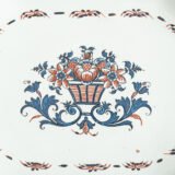 Rouen Faience Tray, an octagonal French banette from c. 1730 with two handles, a painted flower basket, and a red and blue galon rouennais border.