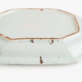 Rouen Faience Tray, an octagonal French banette from c. 1730 with two handles, a painted flower basket, and a red and blue galon rouennais border.