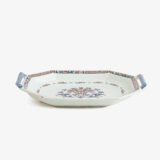 Rouen Faience Tray, an octagonal French banette from c. 1730 with two handles, a painted flower basket, and a red and blue galon rouennais border.