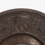 Lauchhammer Cast Iron Charger, Germany, circa 1870–1900, with Renaissance Revival reliefs, a central scene of Venus and Cupid, portrait medallions and scrolling foliage.