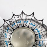 Bohemian Glass Compote, c. 1915, with hand-enamelled birds in scalloped blue panels, geometric glass cutting, gilt rim and a faceted foot decorated with black scrolls and blue leaves.